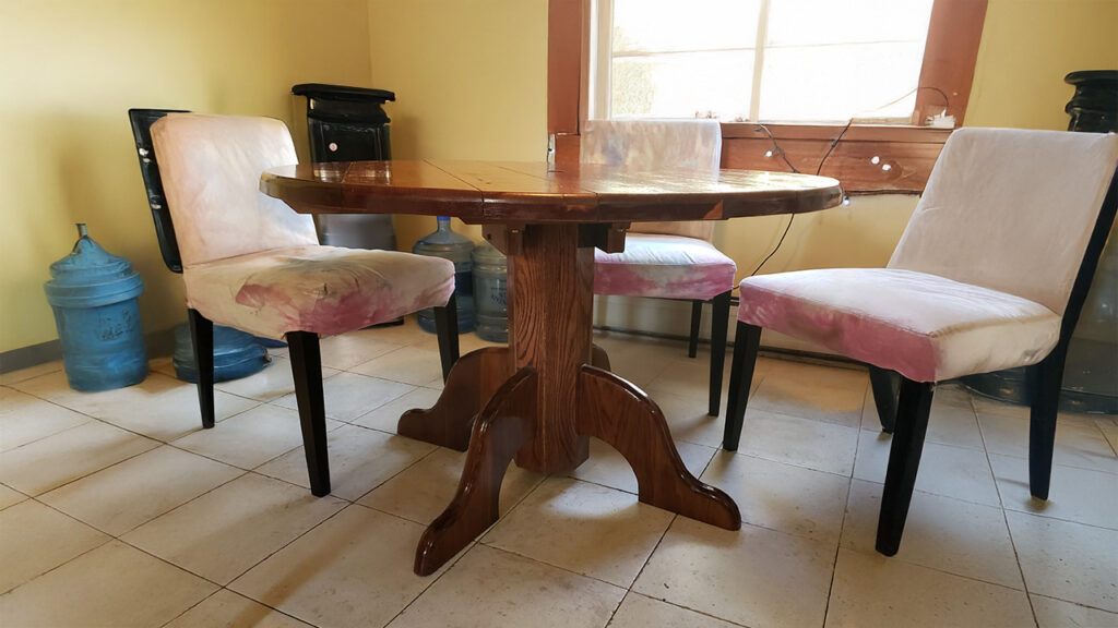 Woodcraft - Total reclamation table project; discarded red wood picnic table top, discarde oak pallet pedestal, legs from a discarded bar.